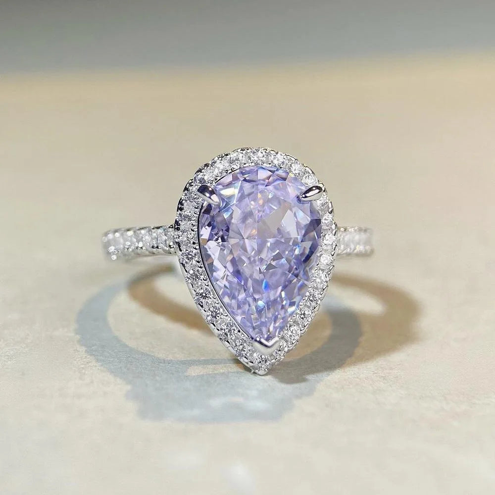 Lumilux Platinum Pear Solitaire Ring — PT950 | Diamond & Moissanite | Blue, Yellow, Pink & Purple