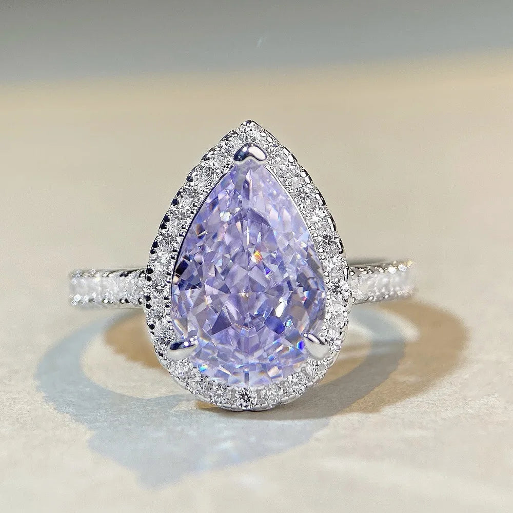 Lumilux Platinum Pear Solitaire Ring — PT950 | Diamond & Moissanite | Blue, Yellow, Pink & Purple