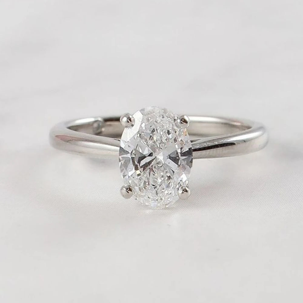 Lumilux Oval Moissanite Solitaire Ring | D Color VVS1 | 925 Sterling Silver & 18K White Gold